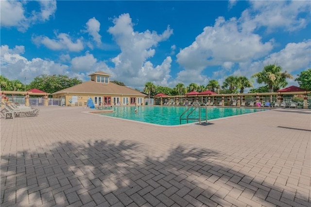 view of swimming pool featuring a patio