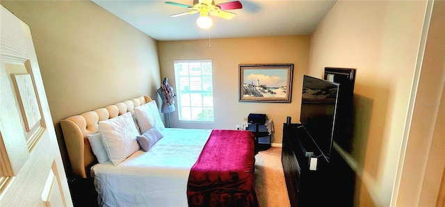 bedroom featuring ceiling fan and carpet flooring