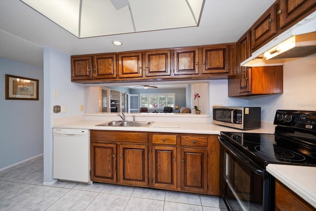 kitchen with white dishwasher, sink, black electric range, ceiling fan, and light tile patterned floors