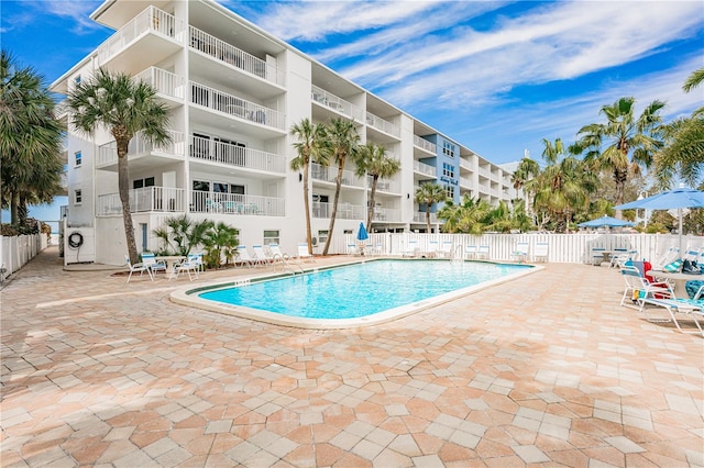 view of swimming pool featuring a patio