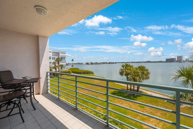 balcony featuring a water view