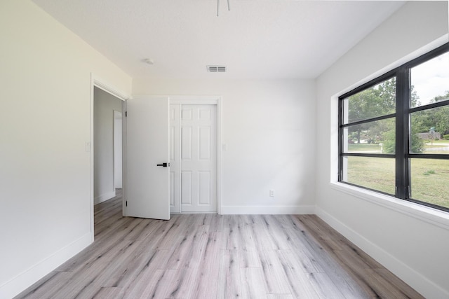 empty room featuring light wood-type flooring