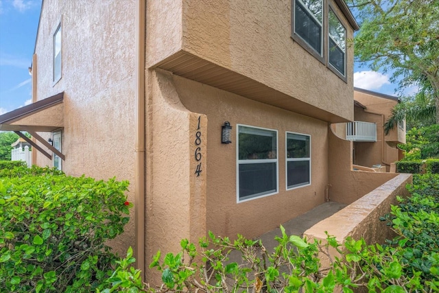 view of home's exterior featuring a balcony