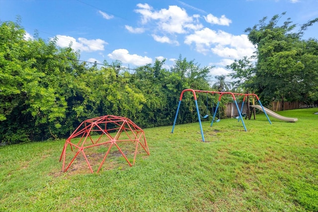 view of playground with a yard