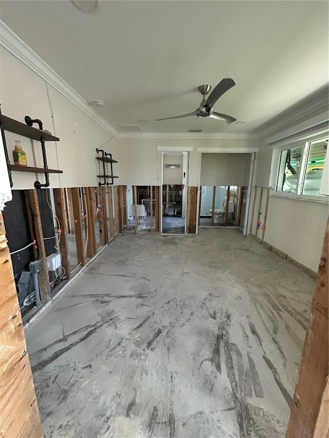 misc room with ceiling fan and ornamental molding