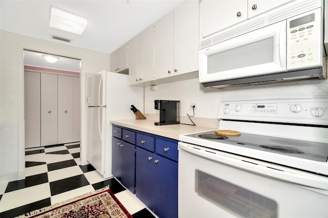 kitchen with white cabinetry, white appliances, and blue cabinetry