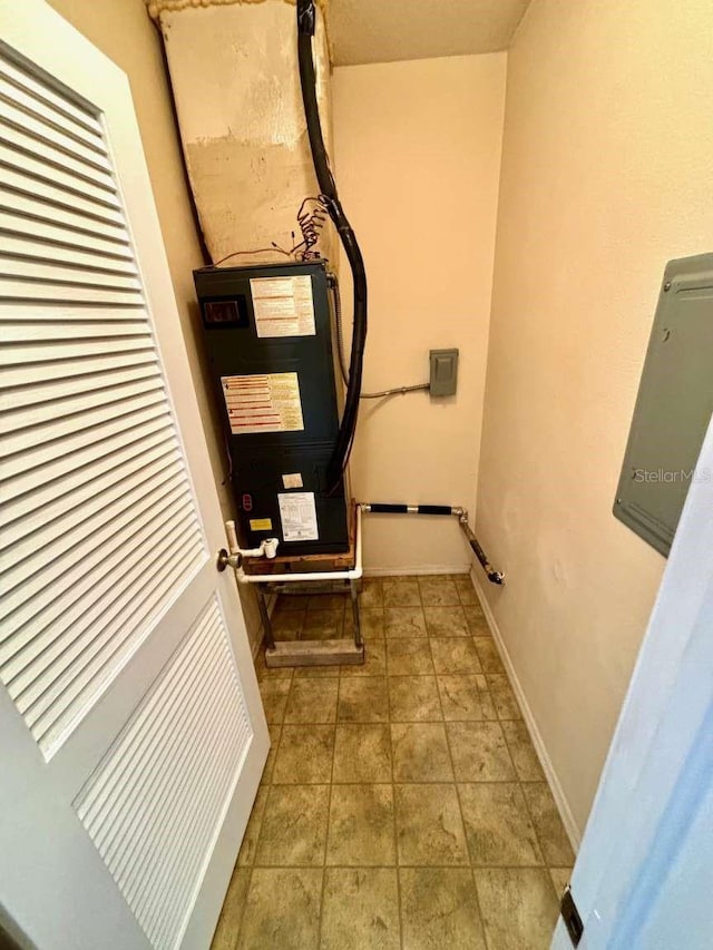 utility room with heating unit