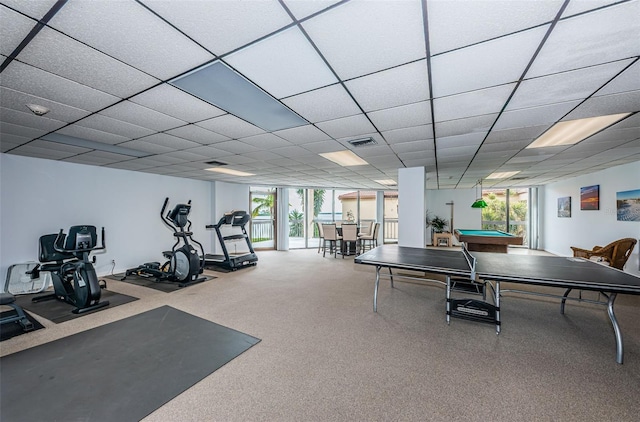 game room with a paneled ceiling, billiards, and a wealth of natural light