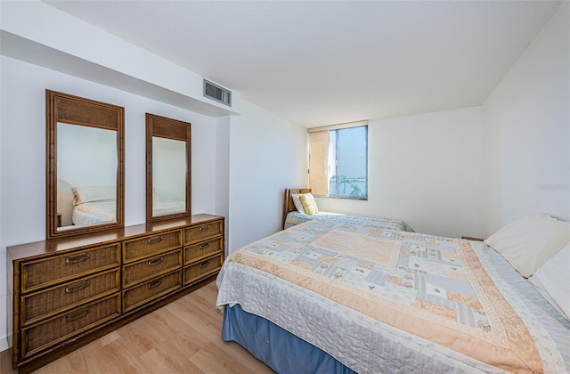 bedroom featuring light hardwood / wood-style floors