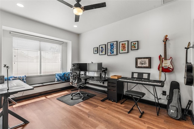 office area with ceiling fan and wood-type flooring