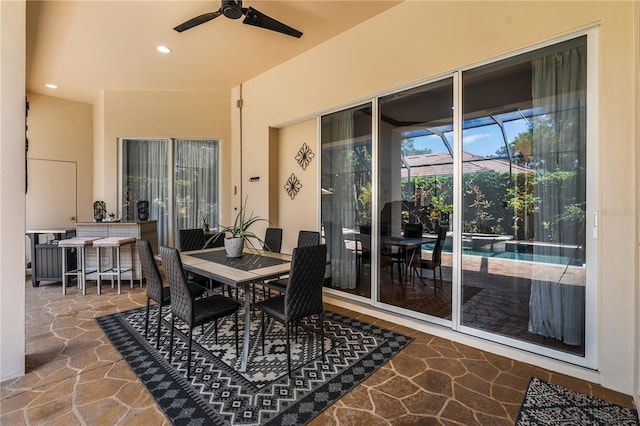 exterior space featuring ceiling fan