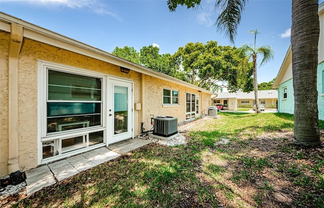 view of yard featuring central AC