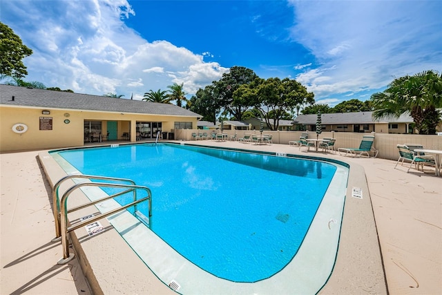 view of pool featuring a patio area