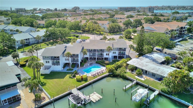 bird's eye view with a water view