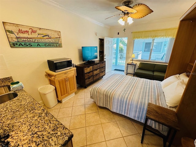 bedroom with ceiling fan, light tile floors, and crown molding