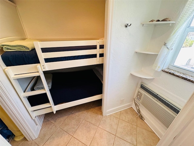 bedroom featuring tile floors