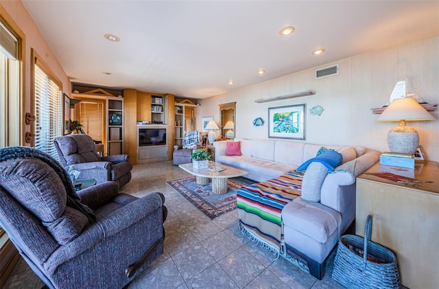 living room featuring tile flooring