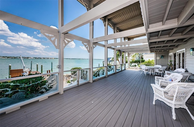 deck featuring a water view