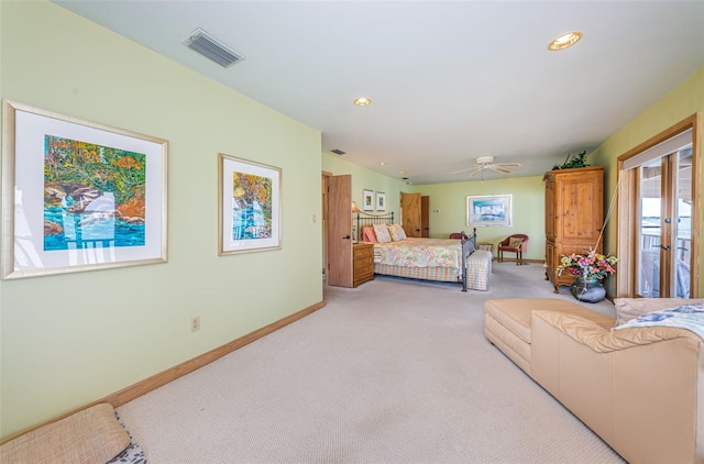 carpeted bedroom with french doors