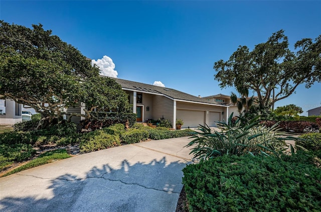 view of front of house featuring driveway and an attached garage