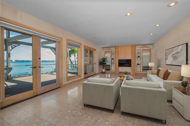 living room featuring recessed lighting and french doors