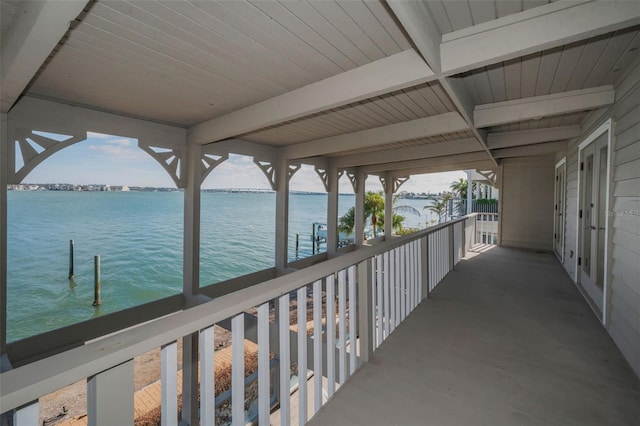 balcony featuring a water view