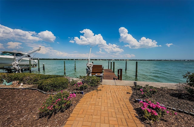 view of dock with a water view