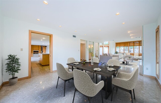 526 Belle Isle Ave, Belleair Beach, FL 33786 - dining space with baseboards, visible vents, and recessed lighting