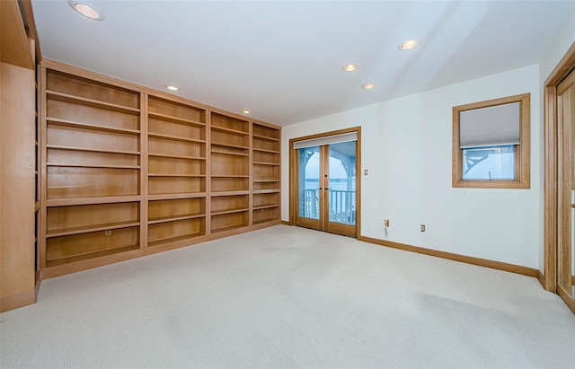 526 Belle Isle Ave, Belleair Beach, FL 33786 - empty room with recessed lighting, carpet floors, baseboards, and french doors