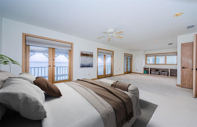 526 Belle Isle Ave, Belleair Beach, FL 33786 - bedroom with multiple windows, access to outside, and french doors