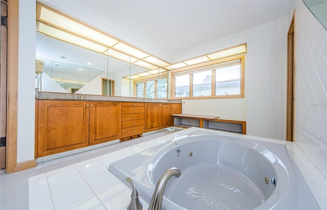 526 Belle Isle Ave, Belleair Beach, FL 33786 - full bathroom featuring tile patterned flooring, a sink, and a jetted tub