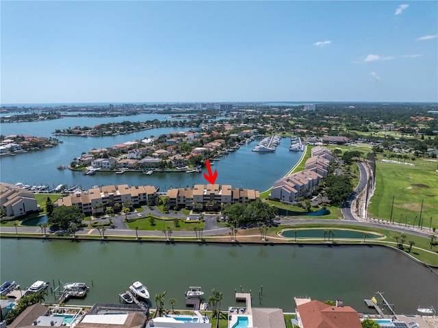 birds eye view of property featuring a water view