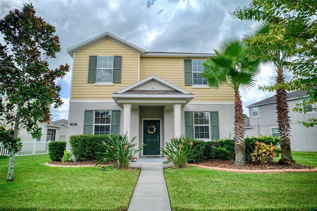 view of front facade with a front yard