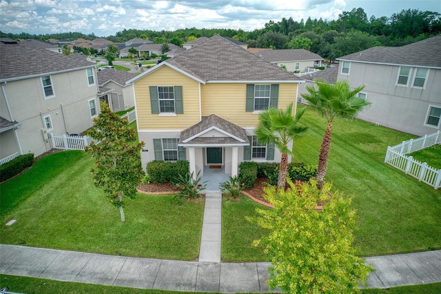 view of front of home featuring a front yard