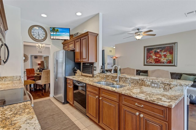 kitchen featuring dishwasher, ceiling fan with notable chandelier, sink, light tile patterned floors, and kitchen peninsula