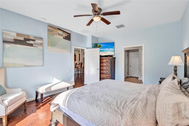 bedroom featuring hardwood / wood-style flooring and ceiling fan