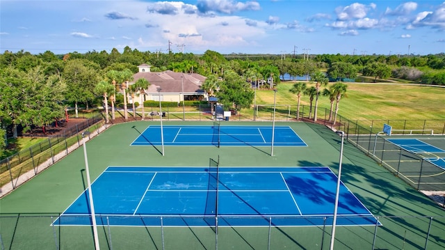 view of sport court with basketball hoop