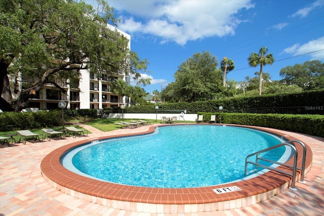 view of pool with a patio area