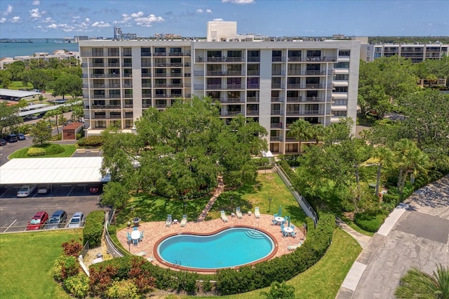 view of pool with a water view