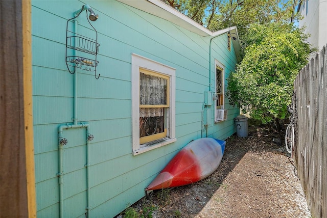 view of side of home with cooling unit