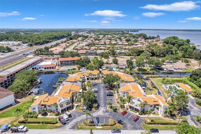 birds eye view of property featuring a water view