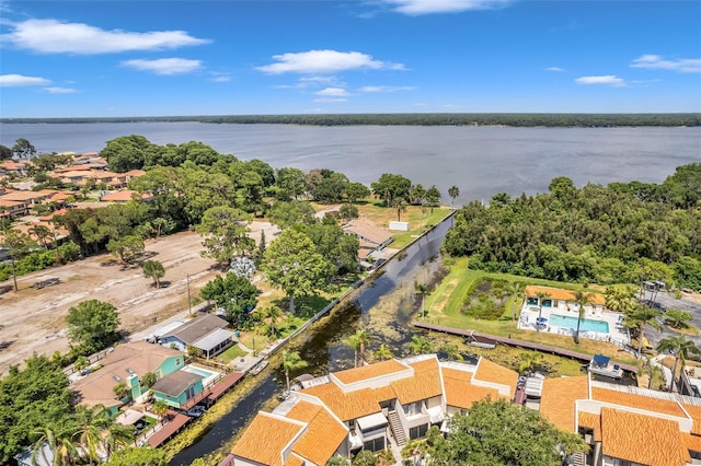 drone / aerial view with a water view