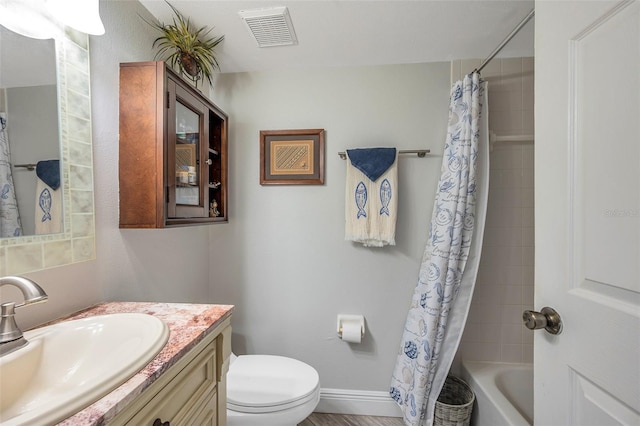 full bathroom with vanity, toilet, and shower / bathtub combination with curtain