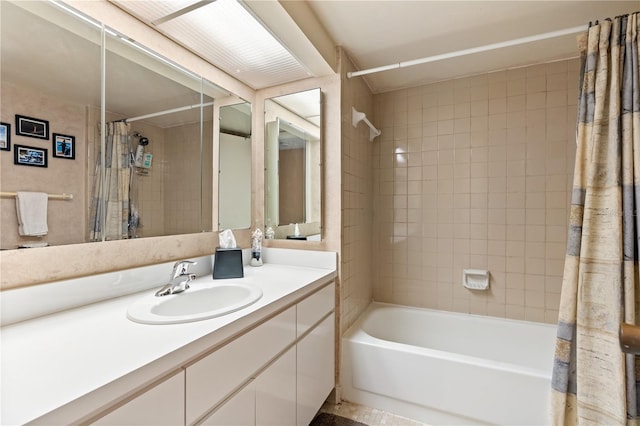 bathroom with shower / bath combo and vanity