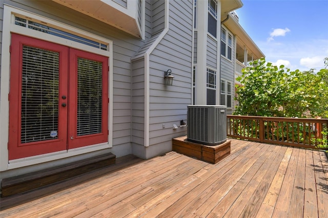 deck featuring central AC unit and french doors