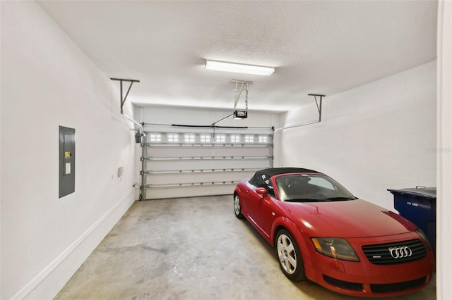 garage with electric panel and a garage door opener