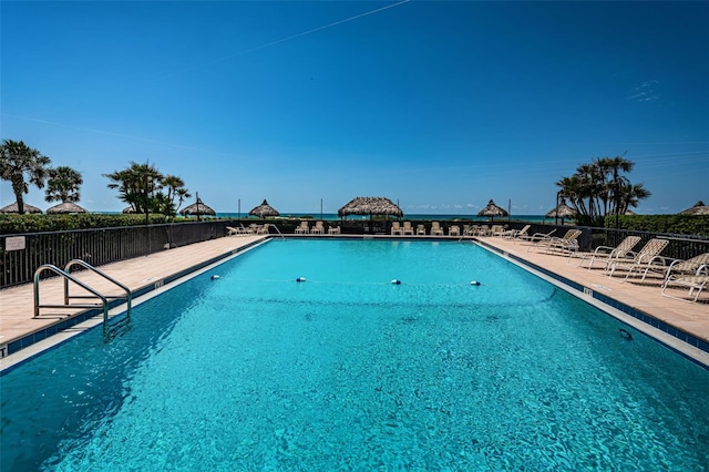 view of swimming pool with a patio area