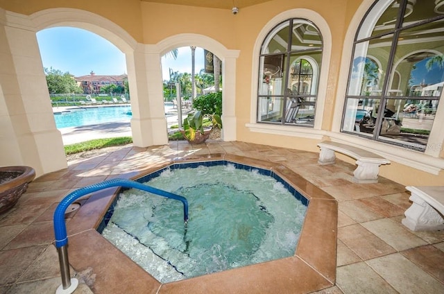 view of swimming pool featuring a patio