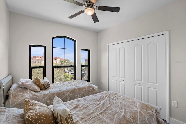 bedroom featuring a closet and ceiling fan