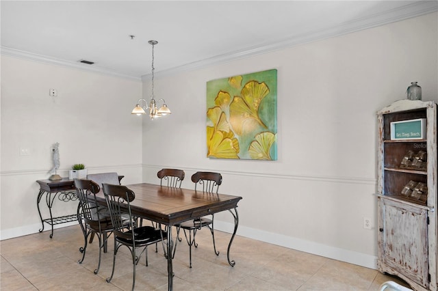 dining space with a notable chandelier, ornamental molding, and light tile patterned flooring